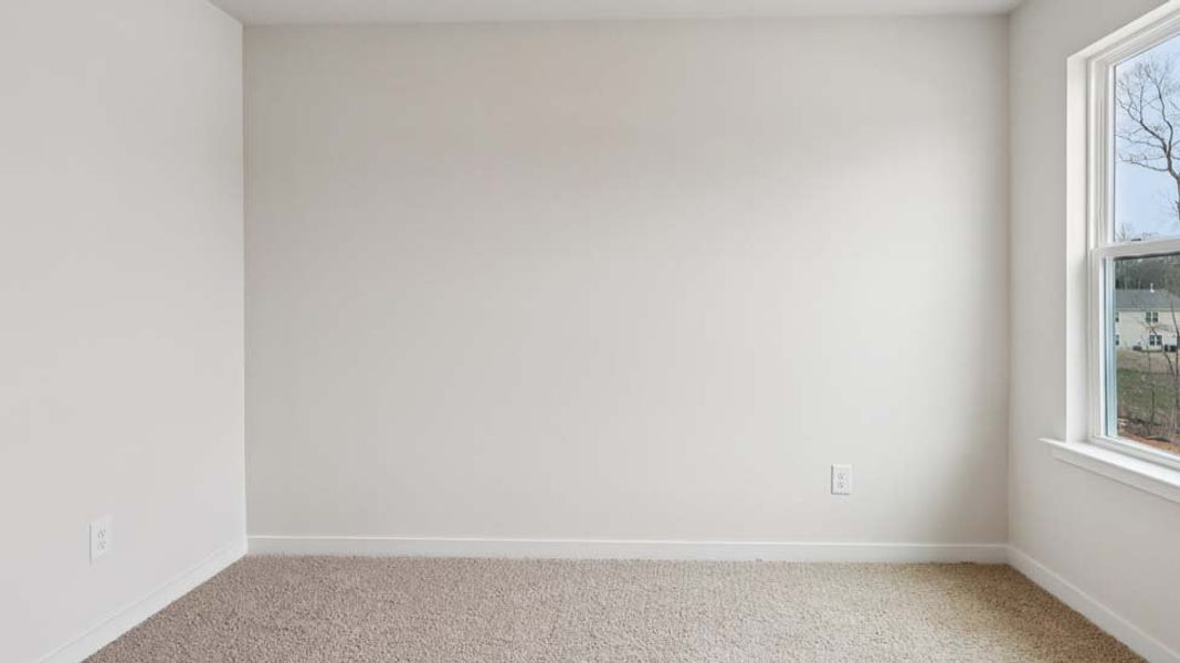 Spacious, unfurnished interior of a new home in Reedy Creek Preserve, Charlotte (Image 24).