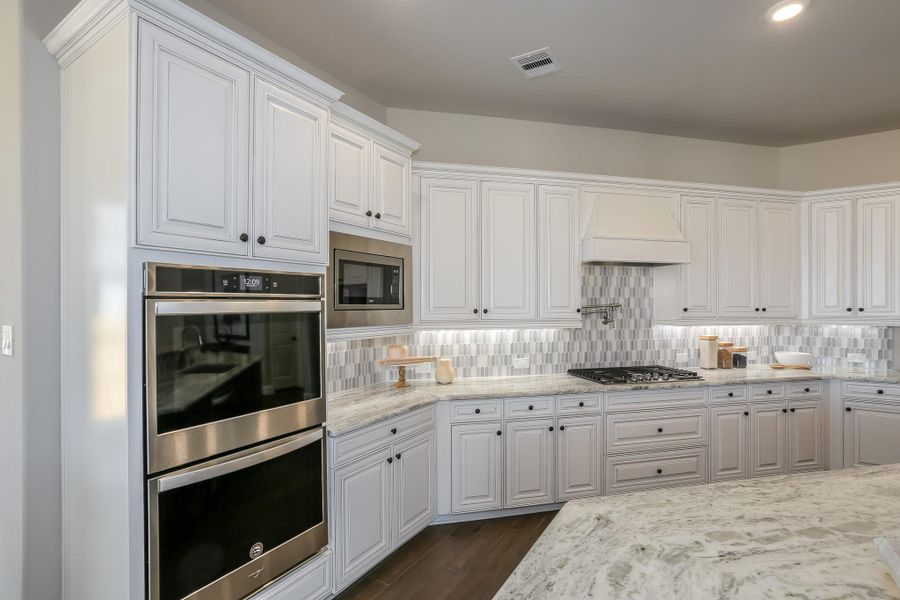 Furnished interior view inside a new home in Valencia: Hilltop Collection, Manvel (Image 8).