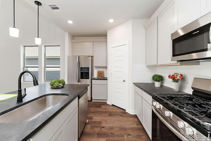 Furnished interior view inside a new home in Hickory Ridge, Elmendorf (Image 2). Furnished interior view inside a new home in Hickory Ridge, Elmendorf (Image 2).