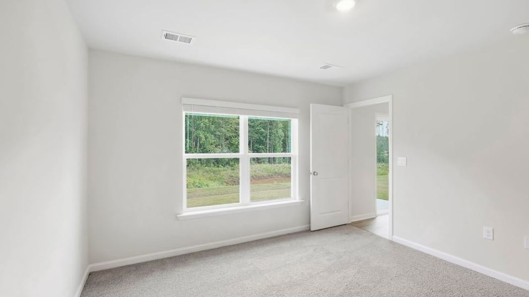 Spacious, unfurnished interior of a new home in Ravencrest, Roebuck (Image 31).