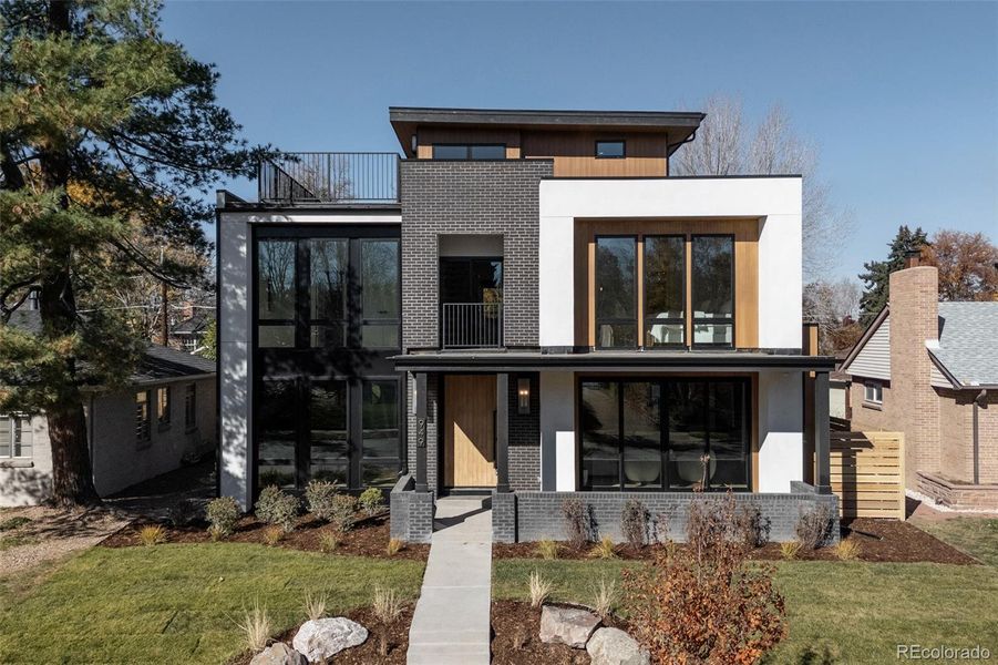 Front exterior of a new home in , Denver, CO, highlighting curb appeal (Image 2).