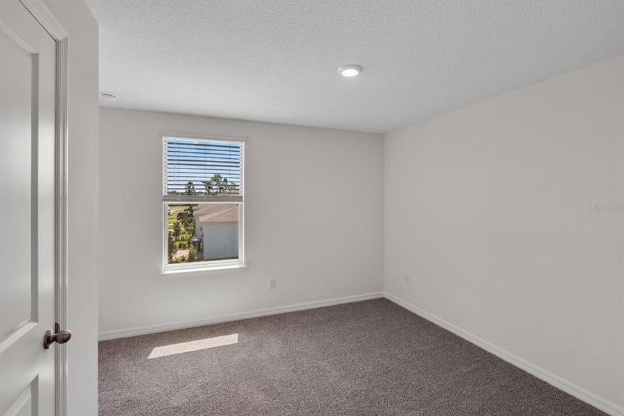 Spacious, unfurnished interior of a new home in Waterleigh, Winter Garden (Image 35).