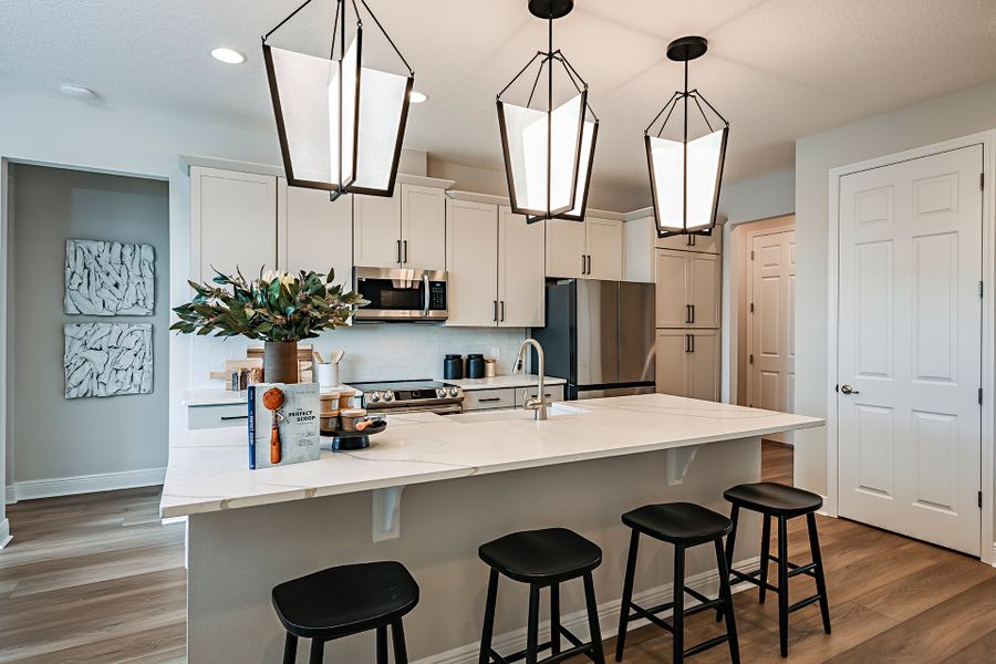 Representative furnished interior of a home built from the Briella by Risewell Homes in Country Club Estates, Palm Bay (Image 8).