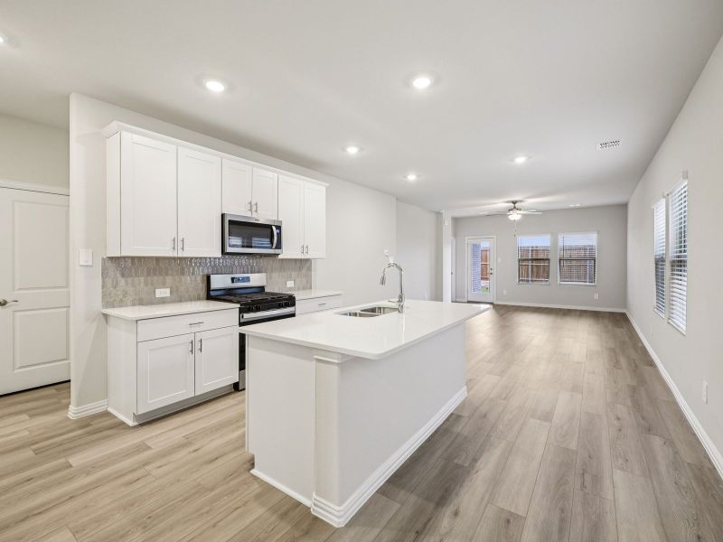 Furnished interior view inside a new home in Parks at Foster Crossing - Spring Series, Anna (Image 6).