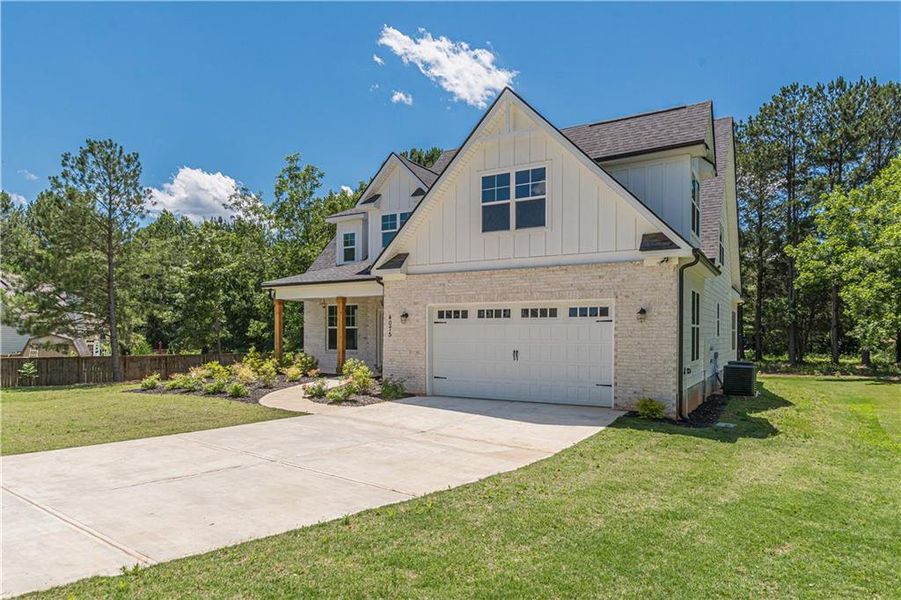 Front exterior of a new home in , McDonough, GA, highlighting curb appeal (Image 24).