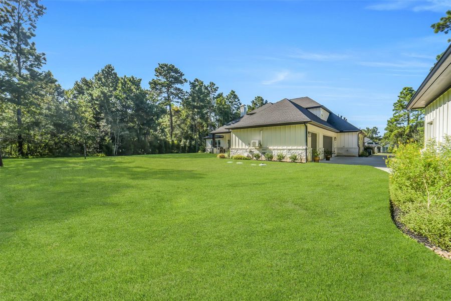 Backyard is surrounded by a cushion of trees for privacy. Backyard is surrounded by a cushion of trees for privacy.