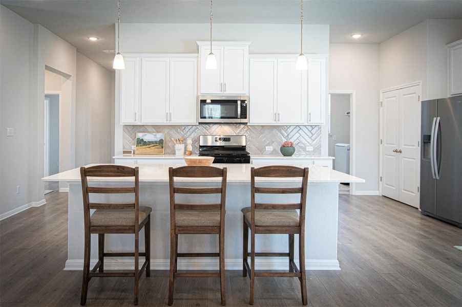 Furnished interior view inside a new home in Sage Hollow, Kyle (Image 14).