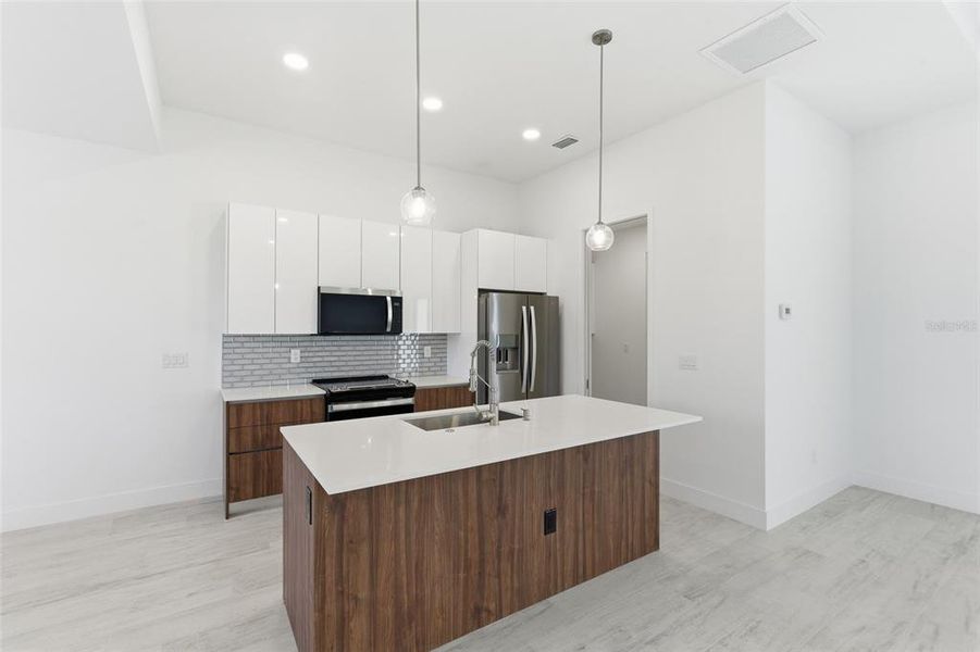 Furnished interior view inside a new home in , Port Charlotte (Image 13).