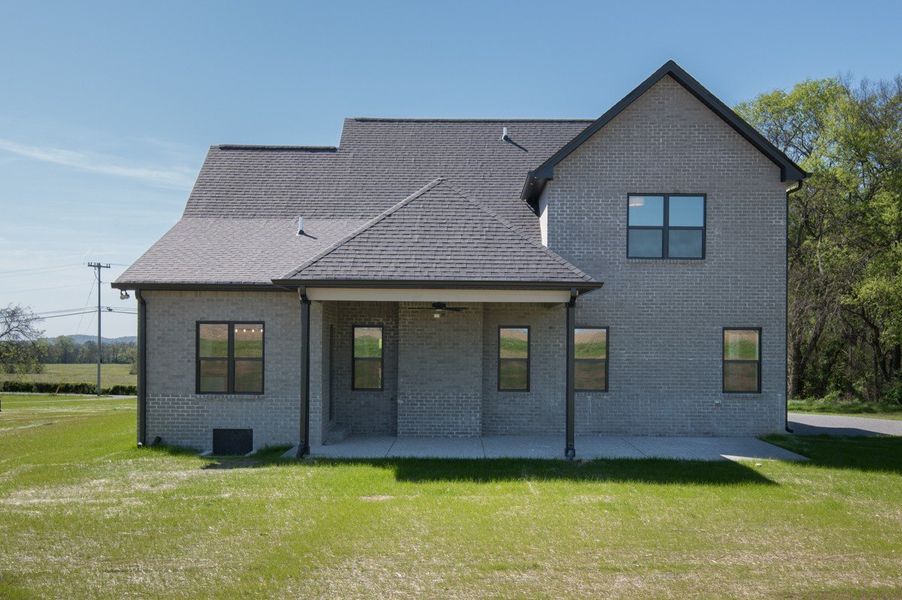 Exterior details and patio area of a home in Whisper Hill, Wendell (Image 36).