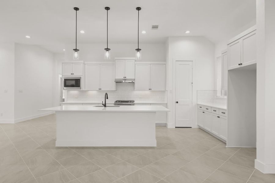 Representative furnished interior of a home built from the Palmer by Chesmar Homes in Riceland Alley Loads, Mont Belvieu (Image 13).