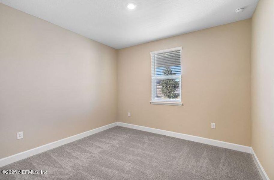 Spacious, unfurnished interior of a new home in Colbert Landings, Palm Coast (Image 13).