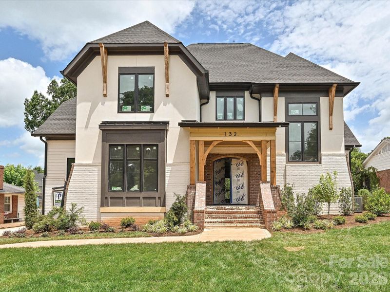 Front exterior of a new home in , Charlotte, NC, highlighting curb appeal (Image 1). Front exterior of a new home in , Charlotte, NC, highlighting curb appeal (Image 1).