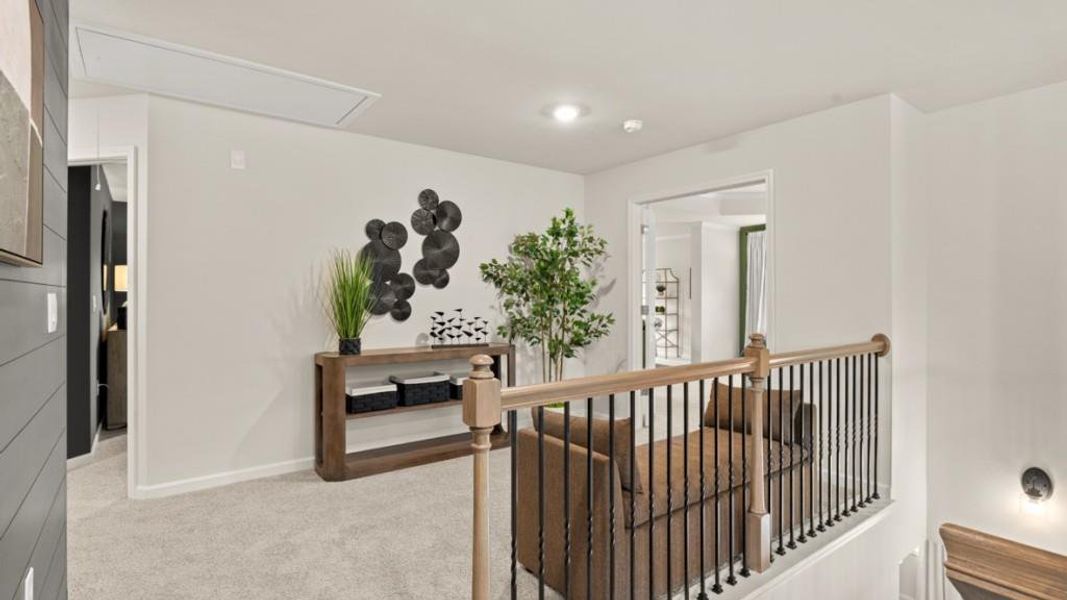 Furnished interior in a model home at Thalley Creek Estates in Cumming (Image 16).