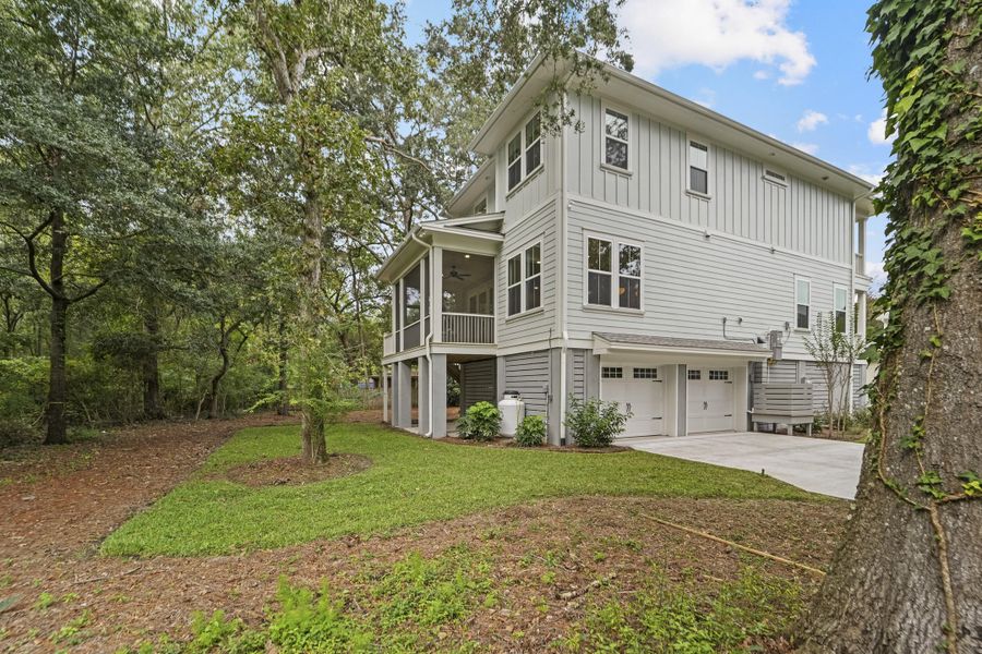 Exterior details and patio area of a home in , Johns Island (Image 29).