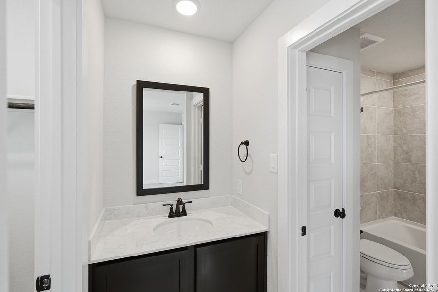Furnished interior view inside a new home in Alsatian Oaks, Castroville (Image 34).