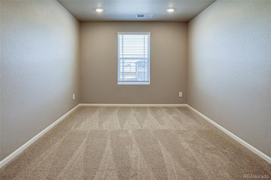 Spacious, unfurnished interior of a new home in Buffalo Highlands: The Flora Collection, Commerce City (Image 17).