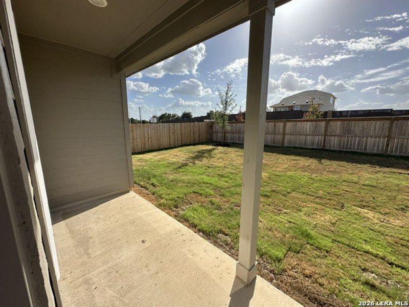 Exterior details and patio area of a home in Juniper Ranch, Spring Branch (Image 17).