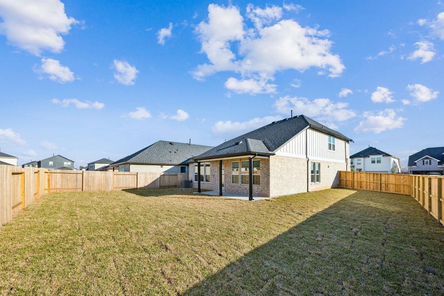 Exterior details and patio area of a home in Montgomery Bend, Montgomery (Image 4).