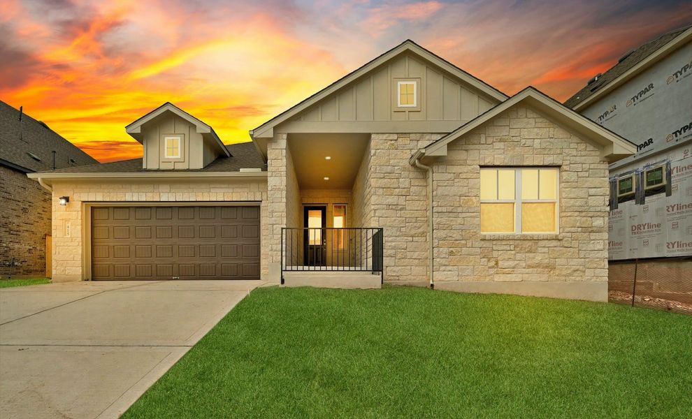 Front exterior of a new home in Anthem, Kyle, TX, highlighting curb appeal (Image 13). Front exterior of a new home in Anthem, Kyle, TX, highlighting curb appeal (Image 13).