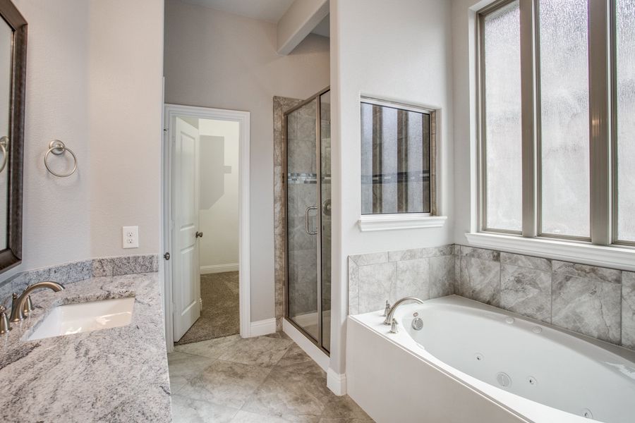 Representative furnished interior of a home built from the Burlington II by Megatel Homes in Santorini, Seagoville (Image 5).