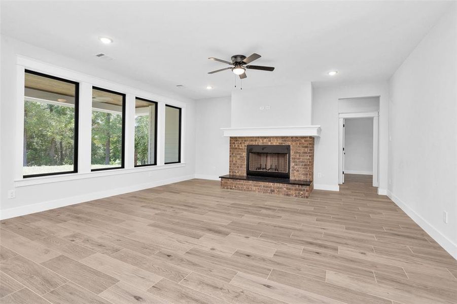 Light and bright with large windows to the back yard. Door leads to secondary bedrooms.