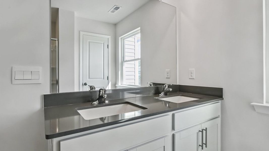 Furnished interior view inside a new home in Chapel Townes, Raleigh (Image 13). Furnished interior view inside a new home in Chapel Townes, Raleigh (Image 13).