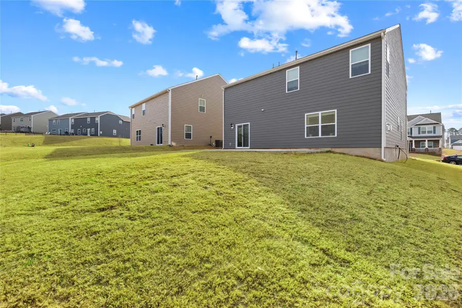 Exterior details and patio area of a home in Adair Woods, Davidson (Image 4). Exterior details and patio area of a home in Adair Woods, Davidson (Image 4).