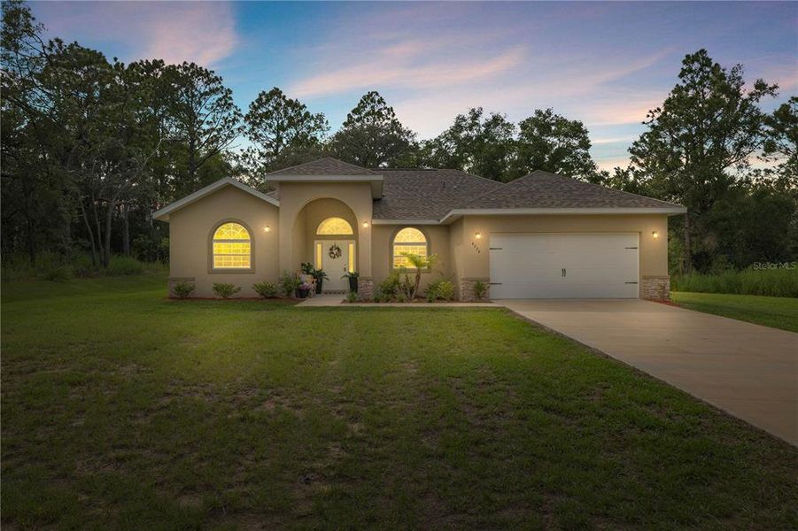 Front exterior of a new home in , Beverly Hills, FL, highlighting curb appeal (Image 20).