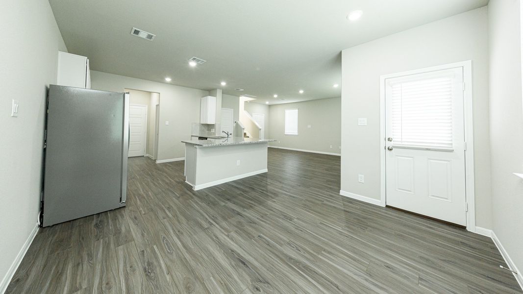 Dining Area to Kitchen and Family Room