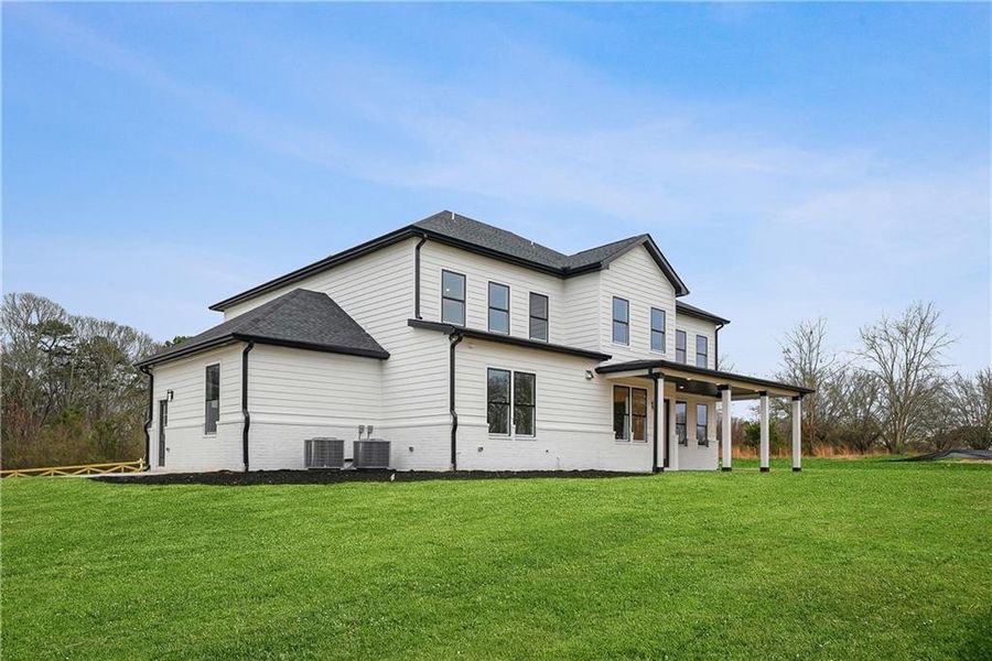 Exterior details and patio area of a home in , Hoschton (Image 27).