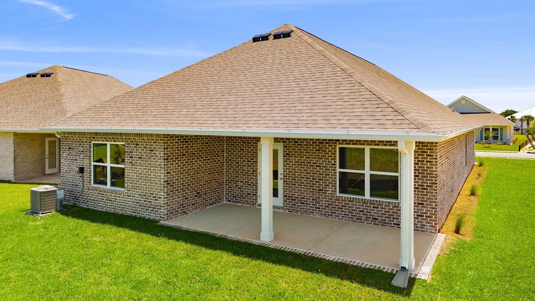 Exterior details and patio area of a home in Owl's Head Farms, Freeport (Image 3).