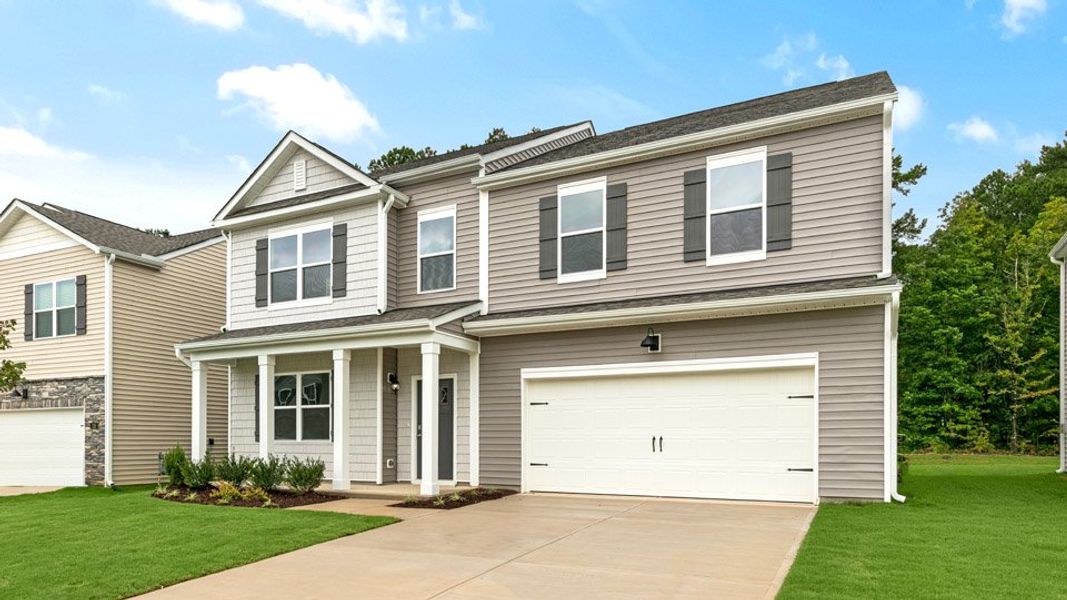 Representative exterior photo of a completed home built from the COLUMBIA by D.R. Horton in Galvins Ridge, Sanford, NC (Image 16).