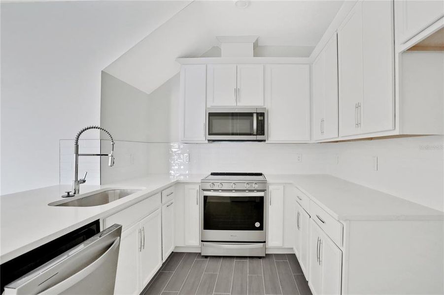 Furnished interior view inside a new home in Seaire, Parrish (Image 10).