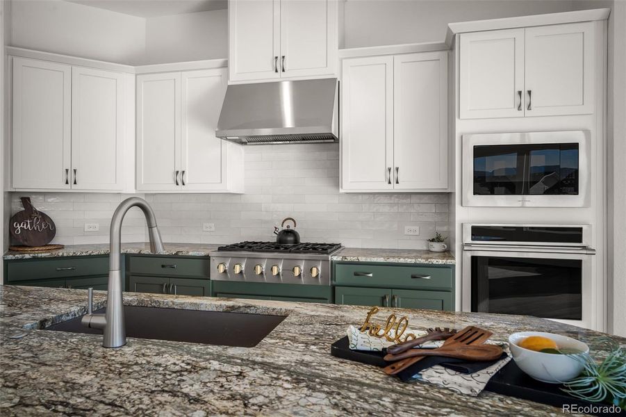 Furnished interior view inside a new home in Cloverleaf - Pinnacle Collection, Monument (Image 7).