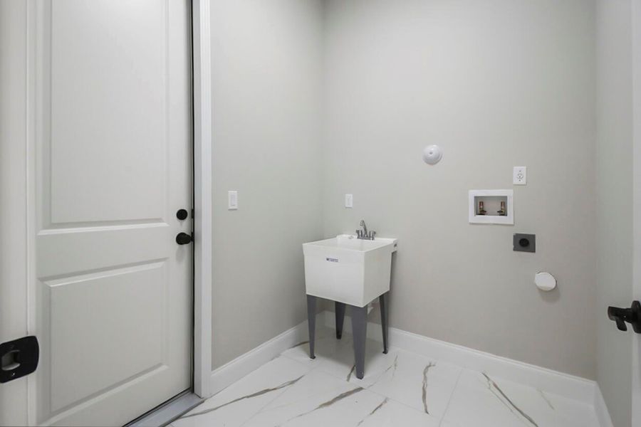 Furnished interior view inside a new home in , Port St. Lucie (Image 10).