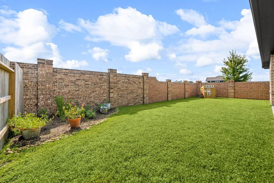 Front exterior of a new home in Lago Mar: Fairway Collections, Texas City, TX, highlighting curb appeal (Image 22). Front exterior of a new home in Lago Mar: Fairway Collections, Texas City, TX, highlighting curb appeal (Image 22).