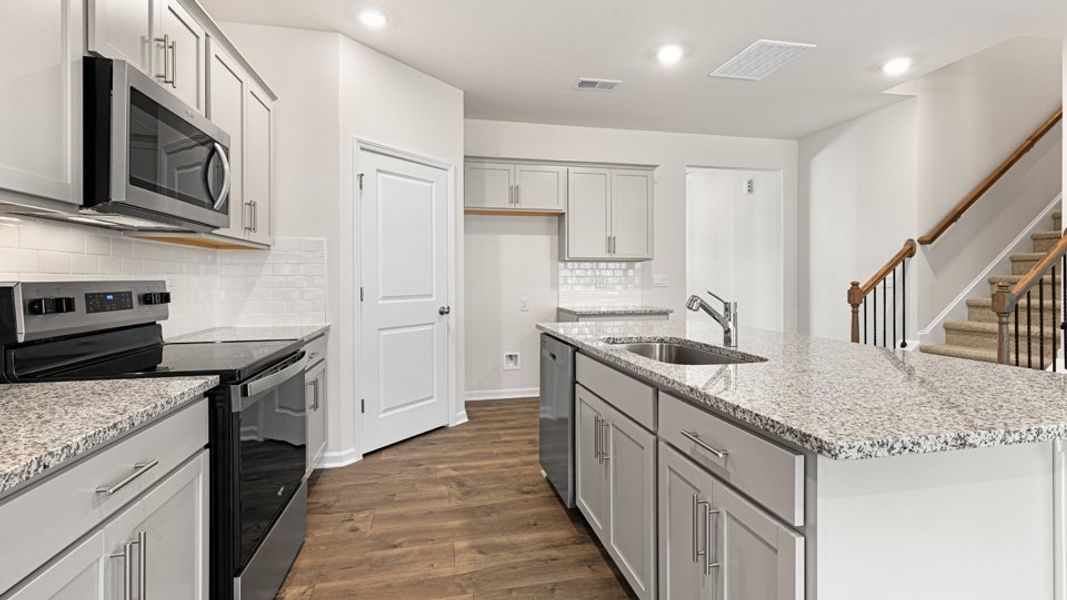 Furnished interior view inside a new home in Mason Ridge, Spring Lake (Image 9).