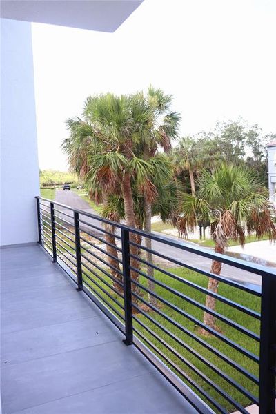 THE VIEW FROM THE BALCONY FRONT OF THE HOUSE