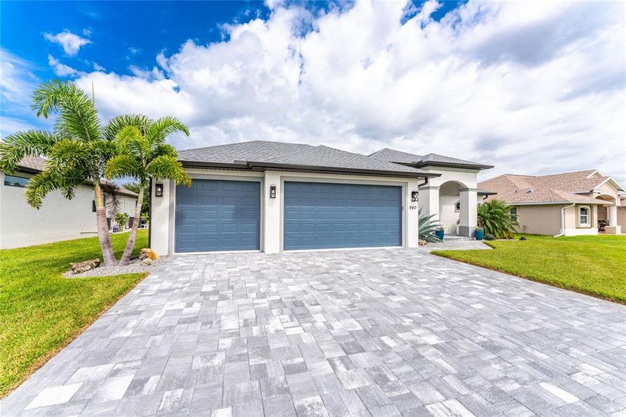 Front exterior of a new home in , Rotonda West, FL, highlighting curb appeal (Image 24).