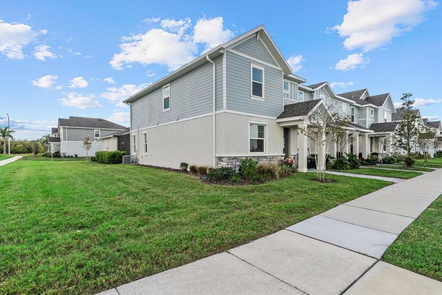 Front exterior of a new home in , Sarasota, FL, highlighting curb appeal (Image 26).