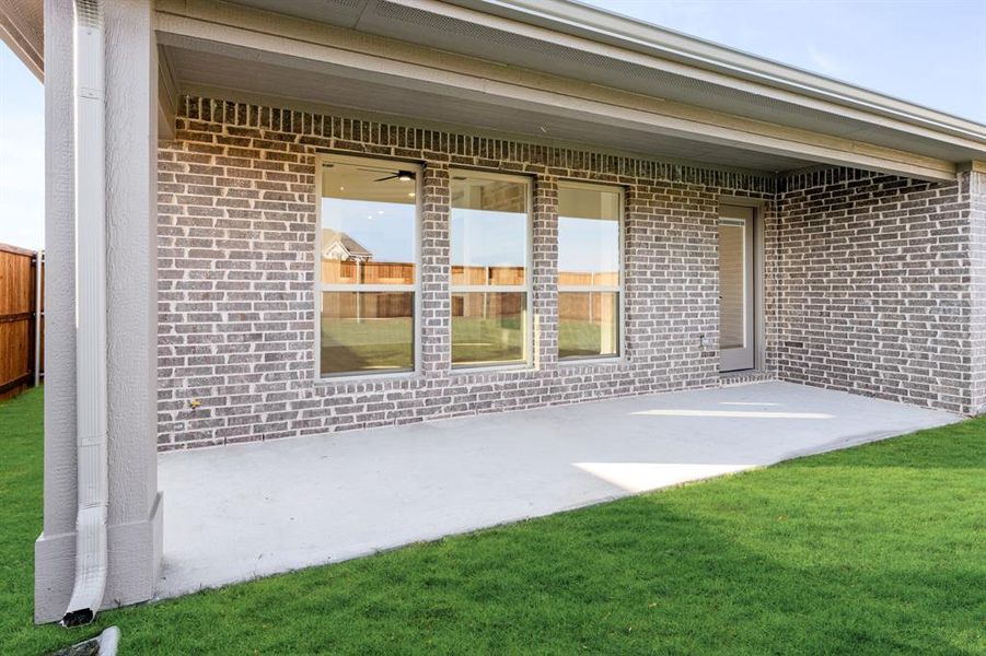 Exterior details and patio area of a home in Stone River Glen 50s, Royse City (Image 4).