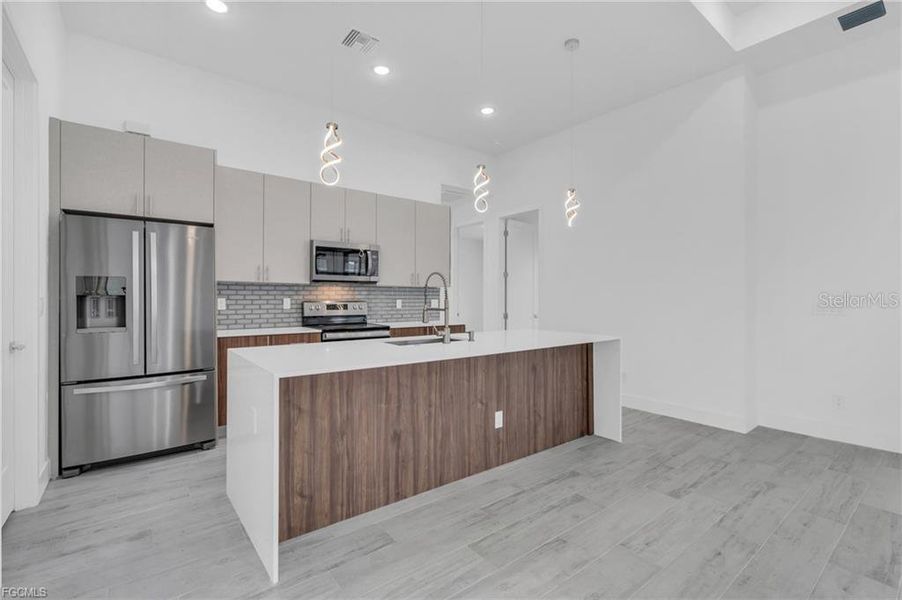 Furnished interior view inside a new home in , Port Charlotte (Image 6).