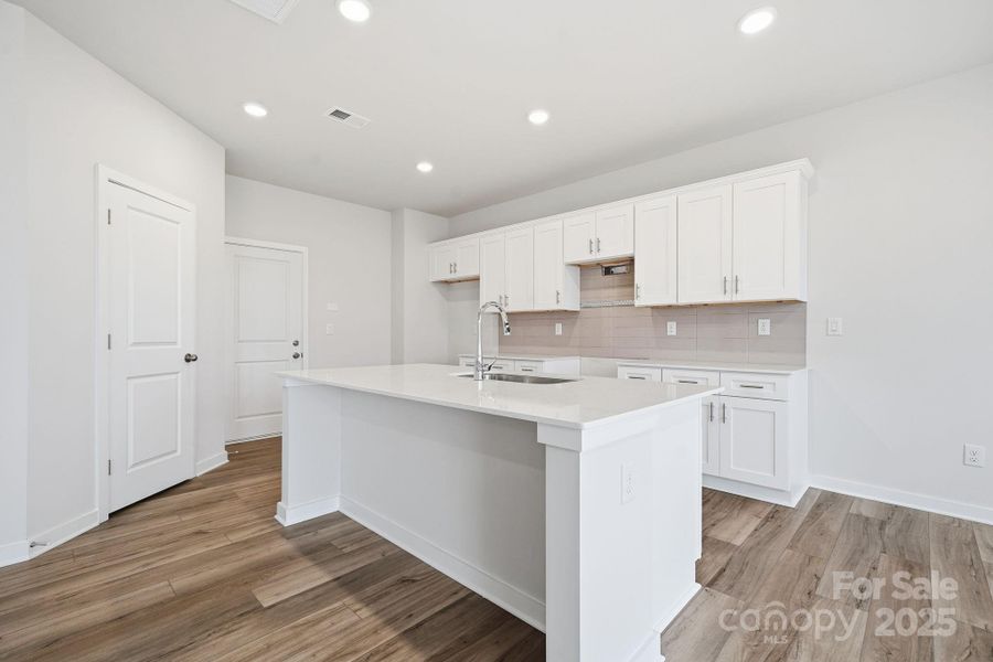 Furnished interior view inside a new home in Meadow Creek Village, Locust (Image 8).