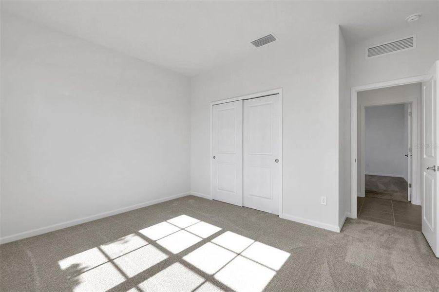 Spacious, unfurnished interior of a new home in Brystol North at Wylder, Port St. Lucie (Image 23).