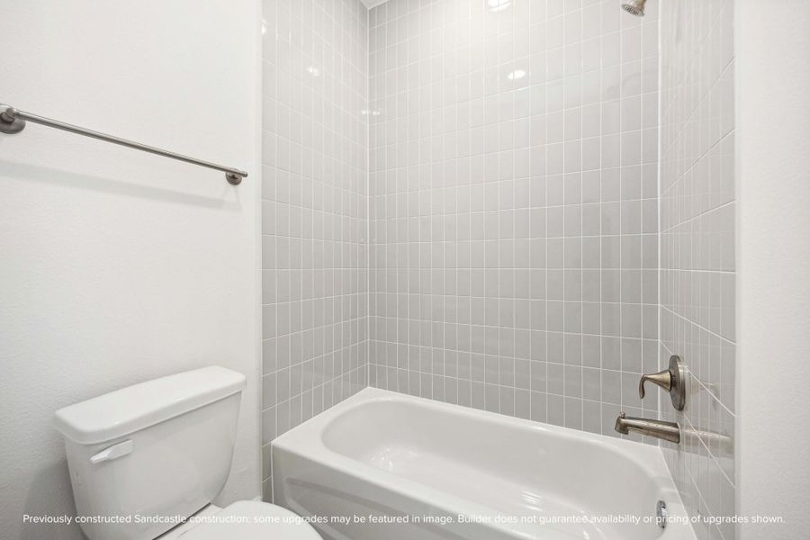 Privacy where it counts, and style that goes all the way up. Full-height tile and thoughtful design make this space a quiet standout. Privacy where it counts, and style that goes all the way up. Full-height tile and thoughtful design make this space a quiet standout.