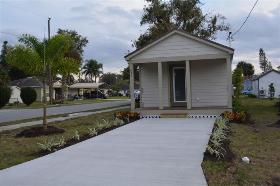 Front exterior of a new home in , Oviedo, FL, highlighting curb appeal (Image 1). Front exterior of a new home in , Oviedo, FL, highlighting curb appeal (Image 1).