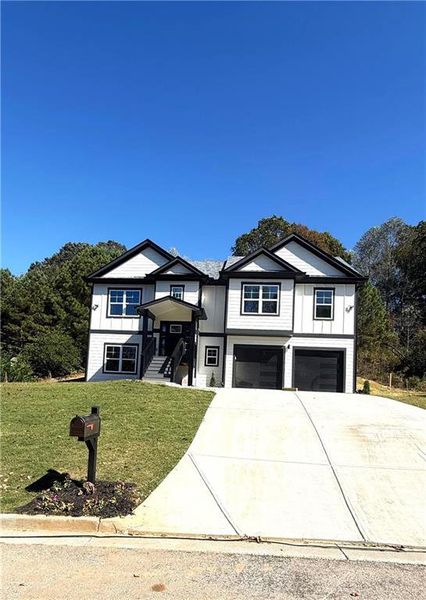 Front exterior of a new home in , Talmo, GA, highlighting curb appeal (Image 2). Front exterior of a new home in , Talmo, GA, highlighting curb appeal (Image 2).