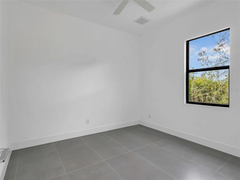 Spacious, unfurnished interior of a new home in , Port Charlotte (Image 38).