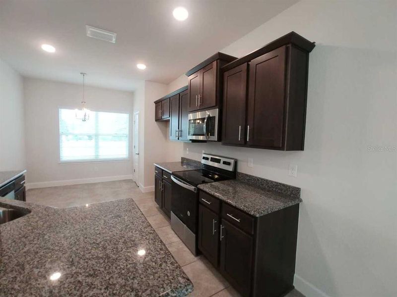 Furnished interior view inside a new home in Ocala Crossings South, Ocala (Image 14). Furnished interior view inside a new home in Ocala Crossings South, Ocala (Image 14).