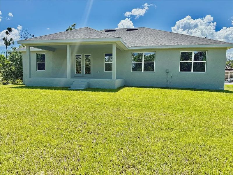 Exterior details and patio area of a home in South Gulf Cove, Port Charlotte (Image 12).